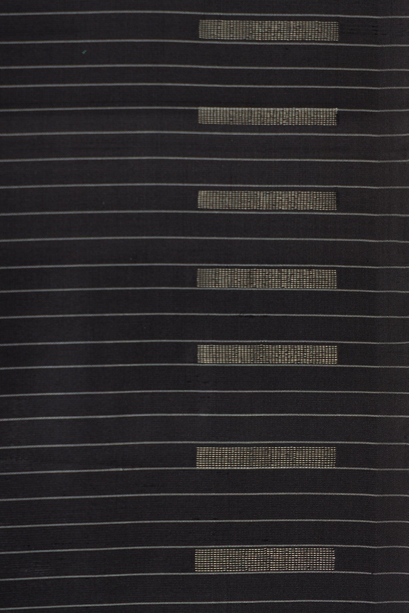Border image of Black Dual Tone Soft Silk Saree with Stripes on the body and Zari Border. 