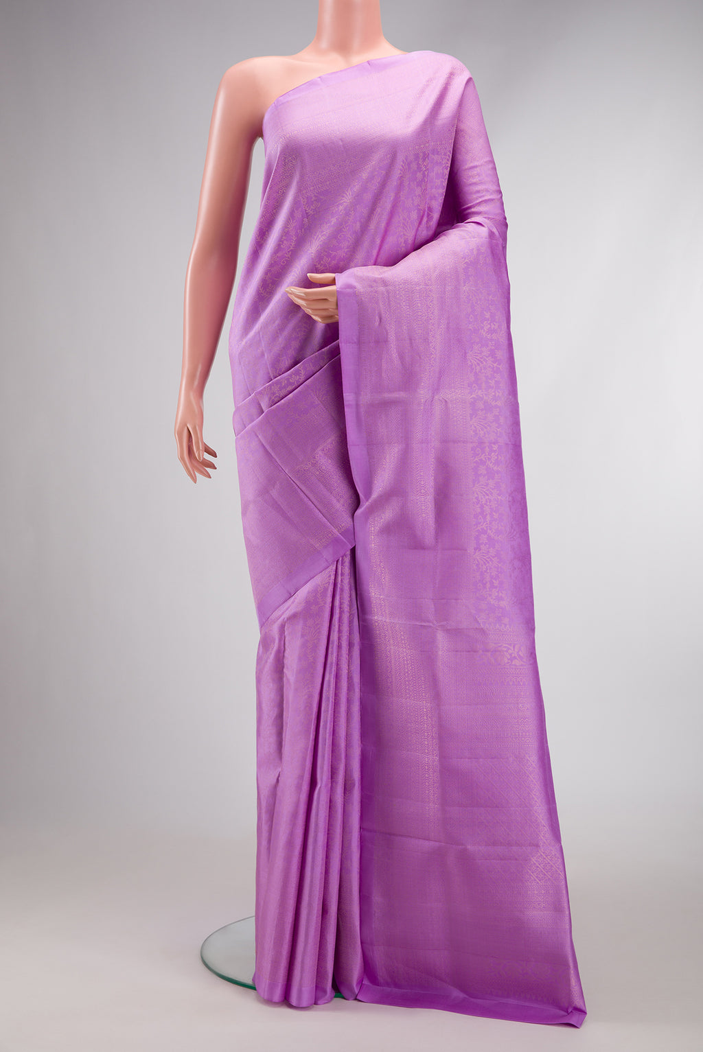 Lavender Dual Tone Soft Silk Saree with Zari Brocade on the body and Zari Border.  displayed on a mannequin
