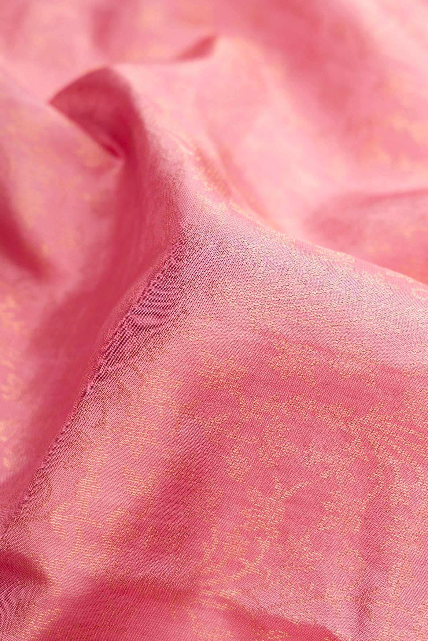 Close up of Pink Dual Tone Soft Silk Saree with Zari Brocade on the body and Zari Border.  displaying folds