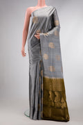 Grey Dual Tone Soft Silk Saree with Zari Butta on the body and Without Border.  displayed on a mannequin
