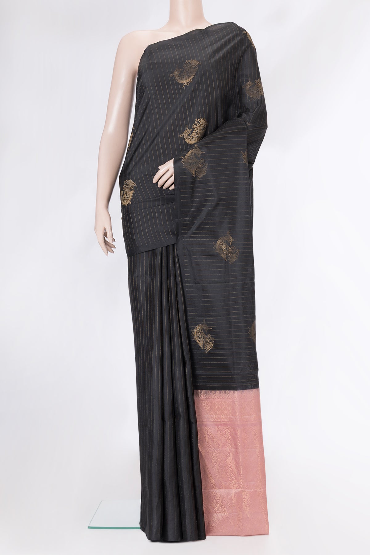Black Soft Silk Saree with Stripes on the body and Without Border.  displayed on a mannequin