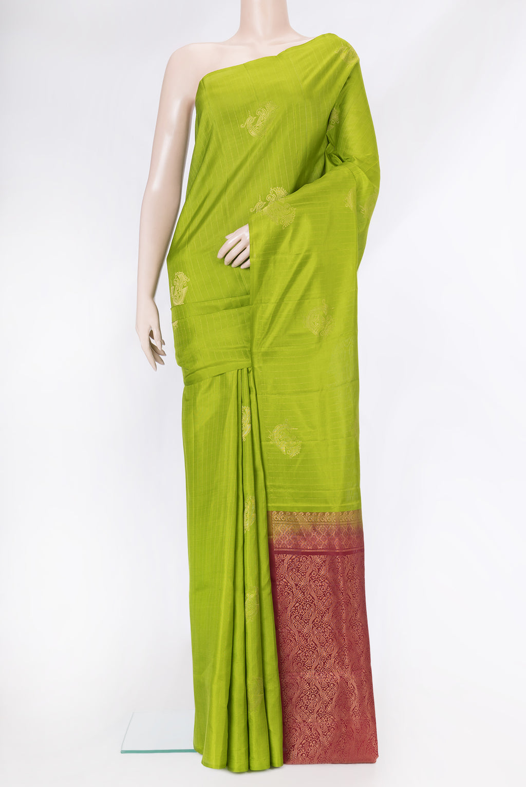 Green Soft Silk Saree with Stripes on the body and Without Border.  displayed on a mannequin