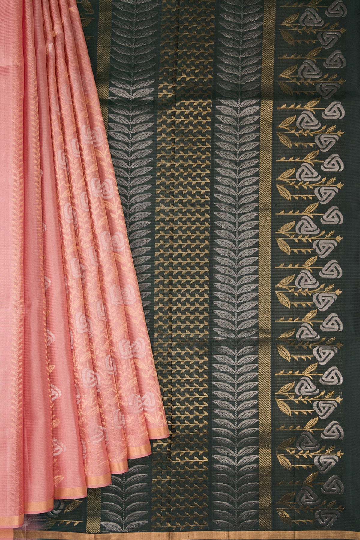 Pleats and pallu of Golden Peach Dual Tone Soft Silk Saree with Zari Butta on the body and Zari Border. 