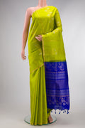 Parrot Green Dual Tone Soft Silk Saree with Zari Butta on the body and Zari Border.  displayed on a mannequin