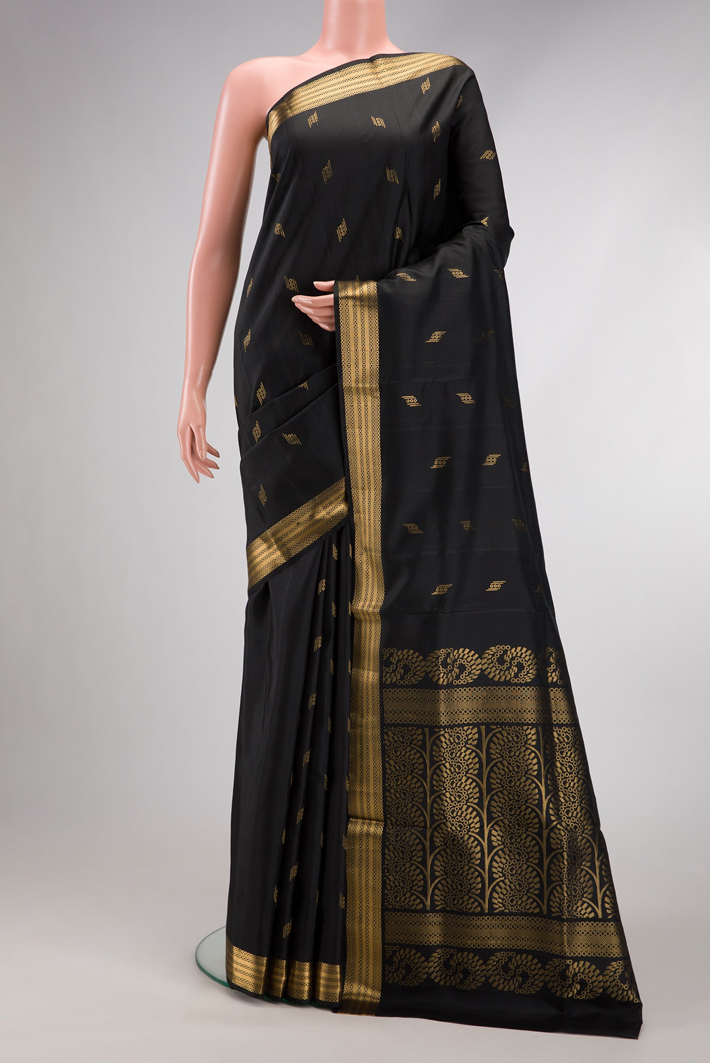 Black Dual Tone Soft Silk Saree with Zari Butta on the body and Zari Border.  displayed on a mannequin