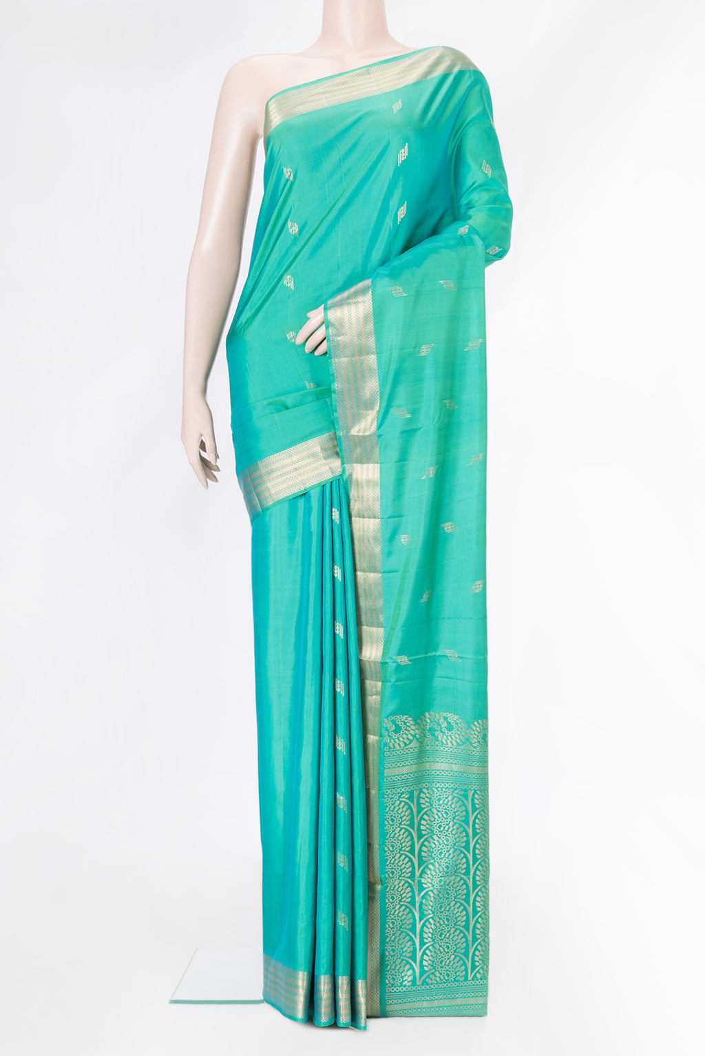 Sea Green Dual Tone Soft Silk Saree with Zari Butta on the body and Zari Border.  displayed on a mannequin
