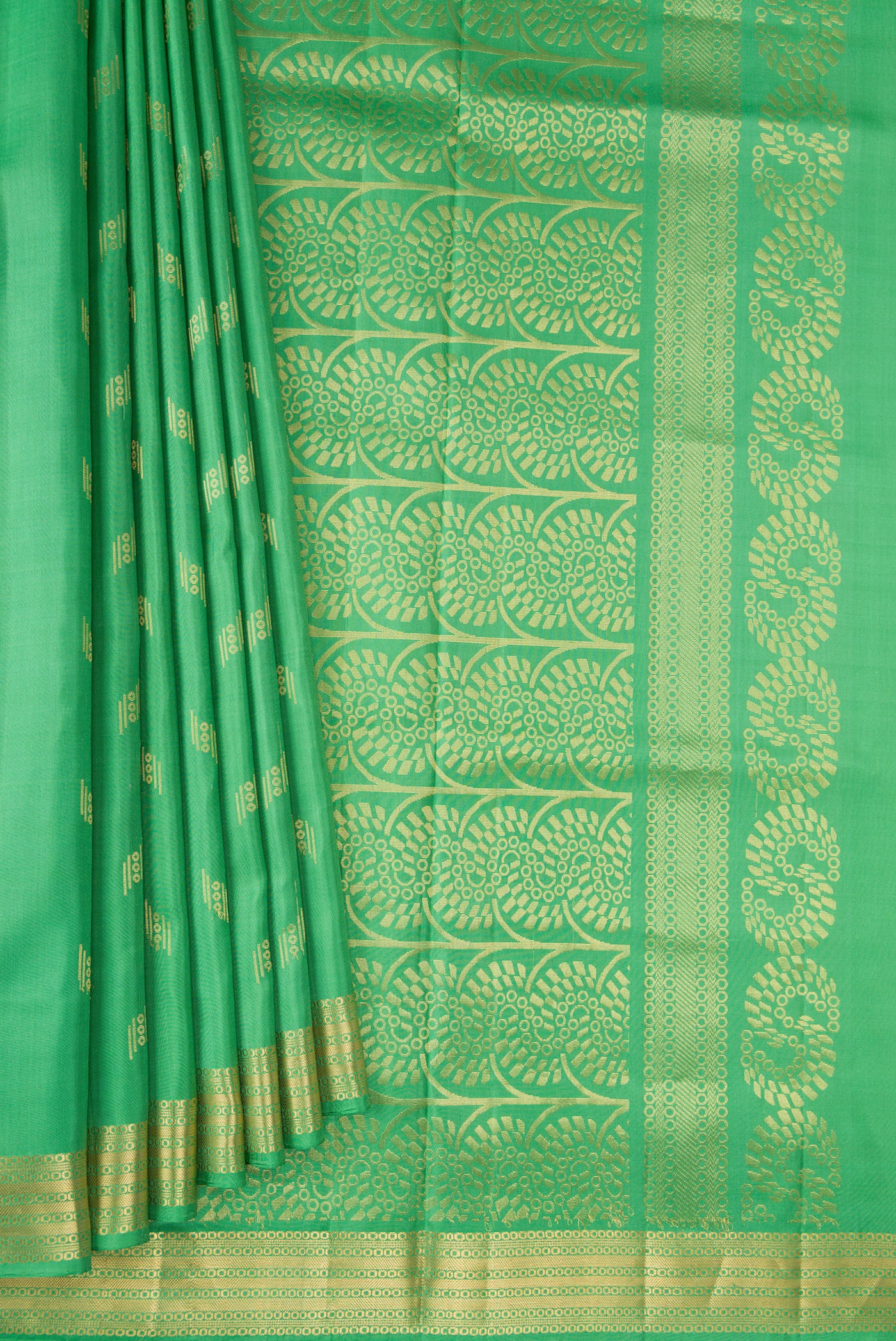 Pleats and pallu of Pista Green Dual Tone Soft Silk Saree with Zari Butta on the body and Zari Border. 