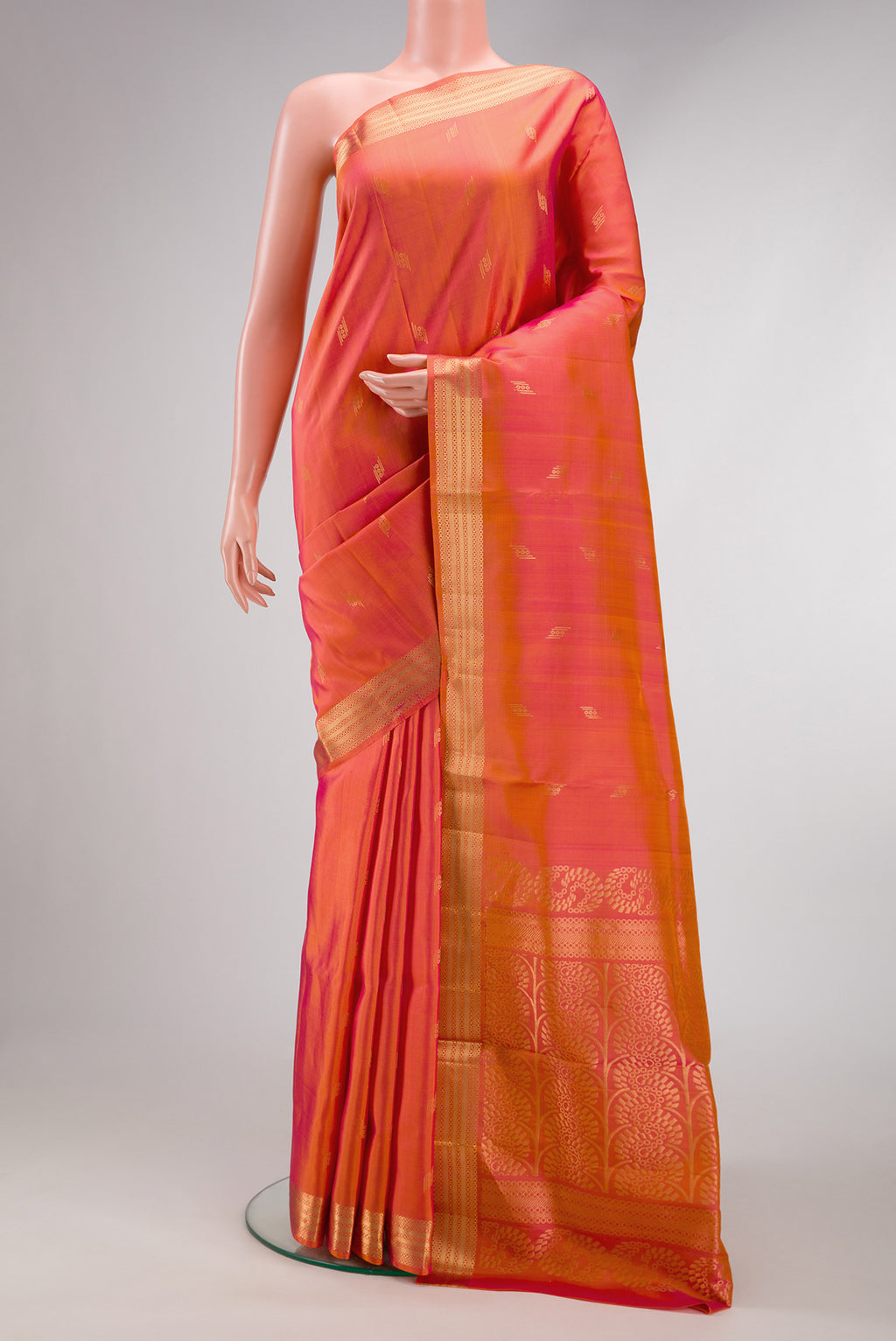 Coral Dual Tone Soft Silk Saree with Zari Butta on the body and Zari Border.  displayed on a mannequin