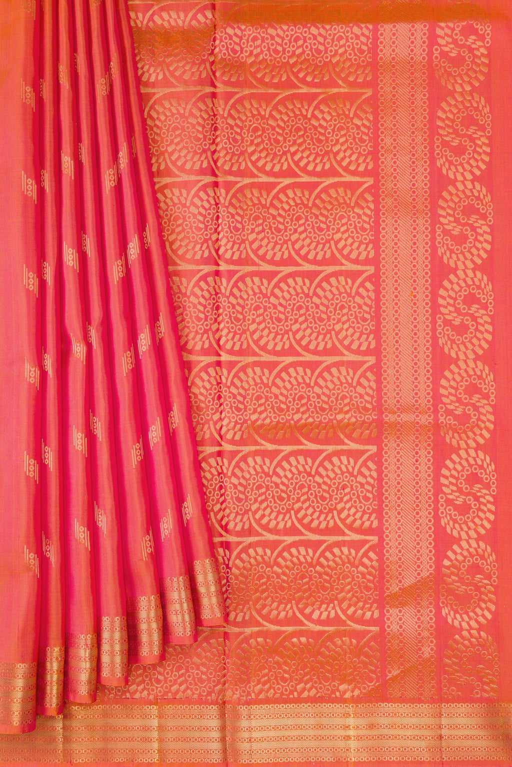 Pleats and pallu of Coral Dual Tone Soft Silk Saree with Zari Butta on the body and Zari Border. 