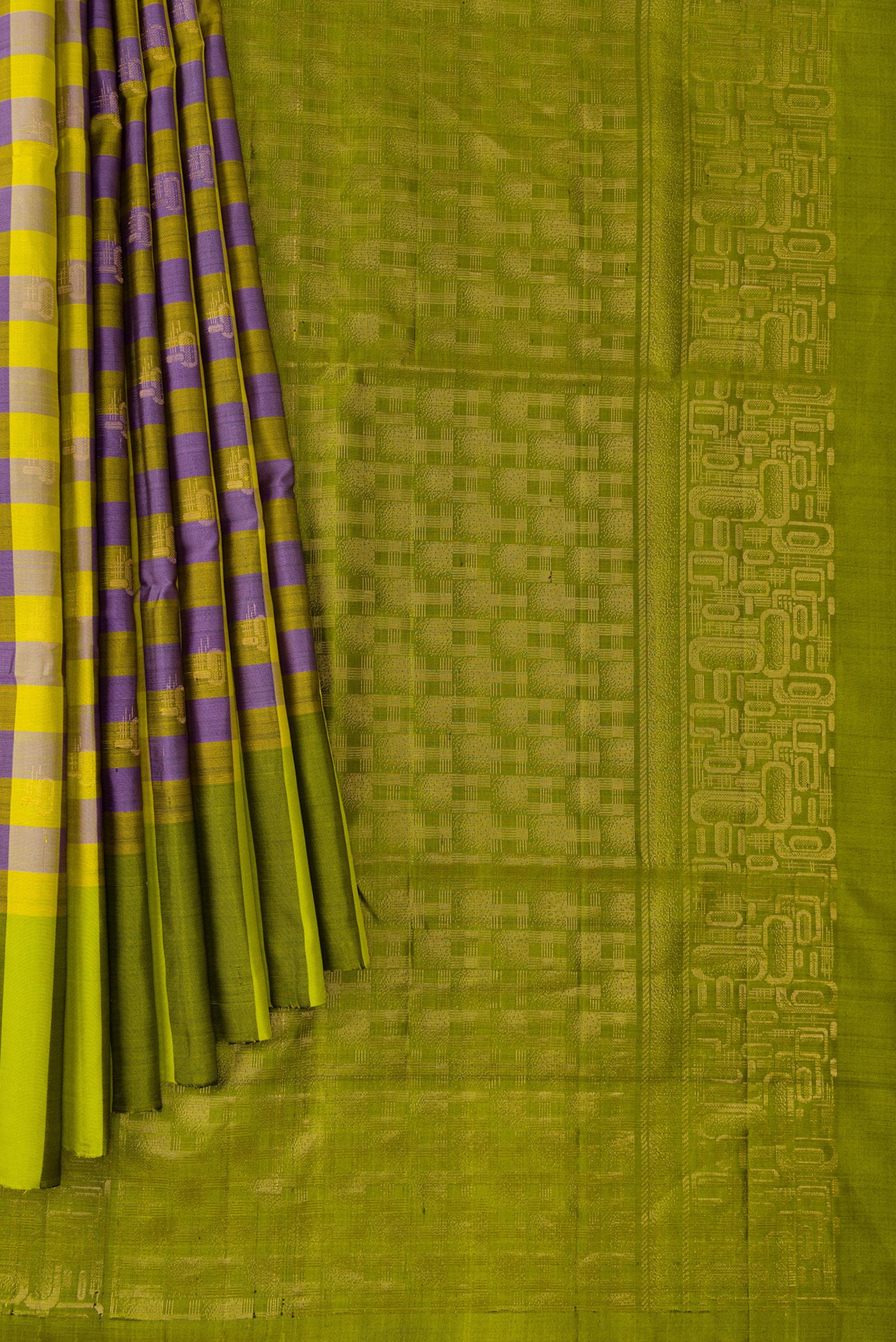 Pleats and pallu of Parrot Green and Royal Blue Color Soft Silk Saree with Checked design on the body and Checks Border. 