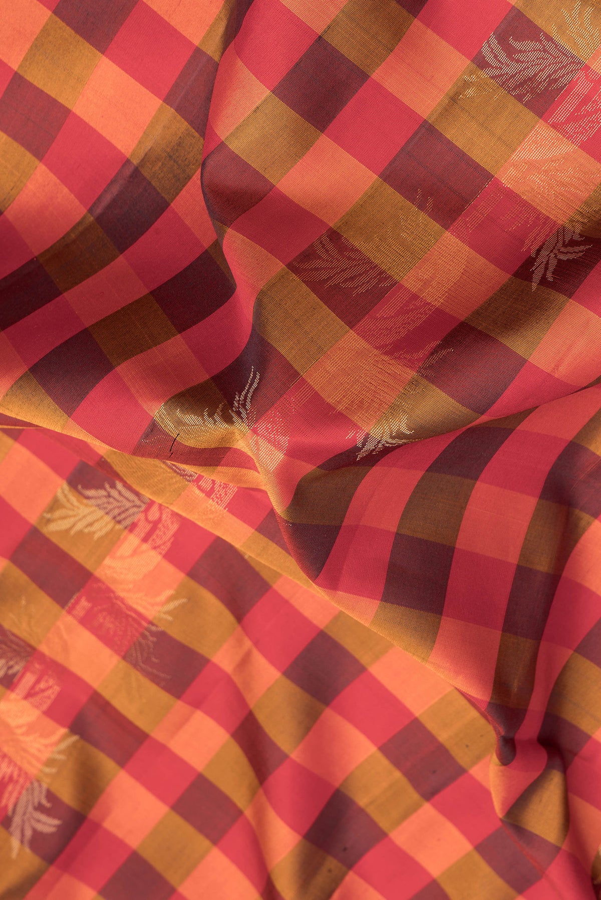 Close up of Multi Color Soft Silk Saree with Checked design on the body and Zari Border.  displaying folds