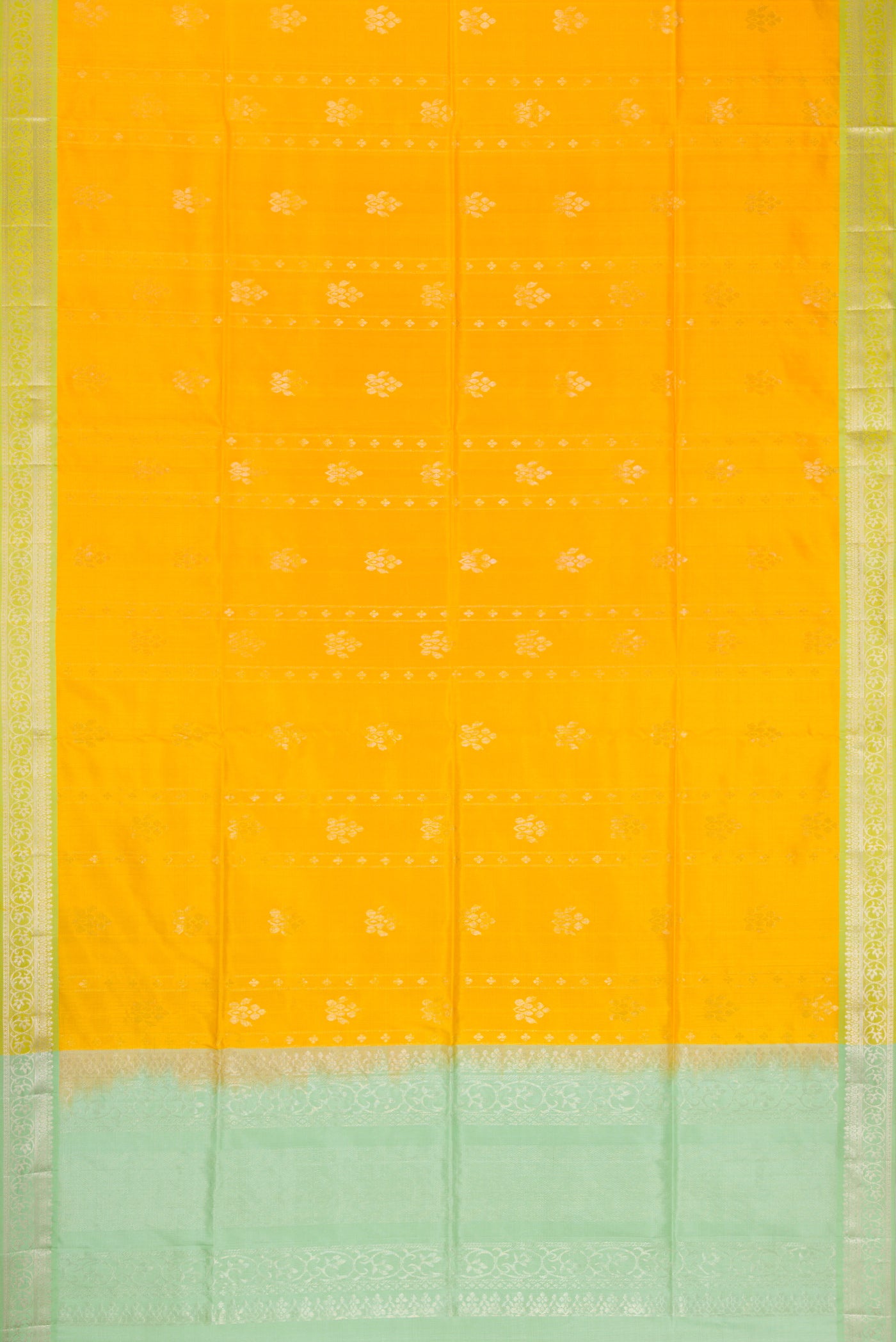 Flat view of Yellow Dual Tone Soft Silk Saree with Zari Butta on the body and Zari Border. 