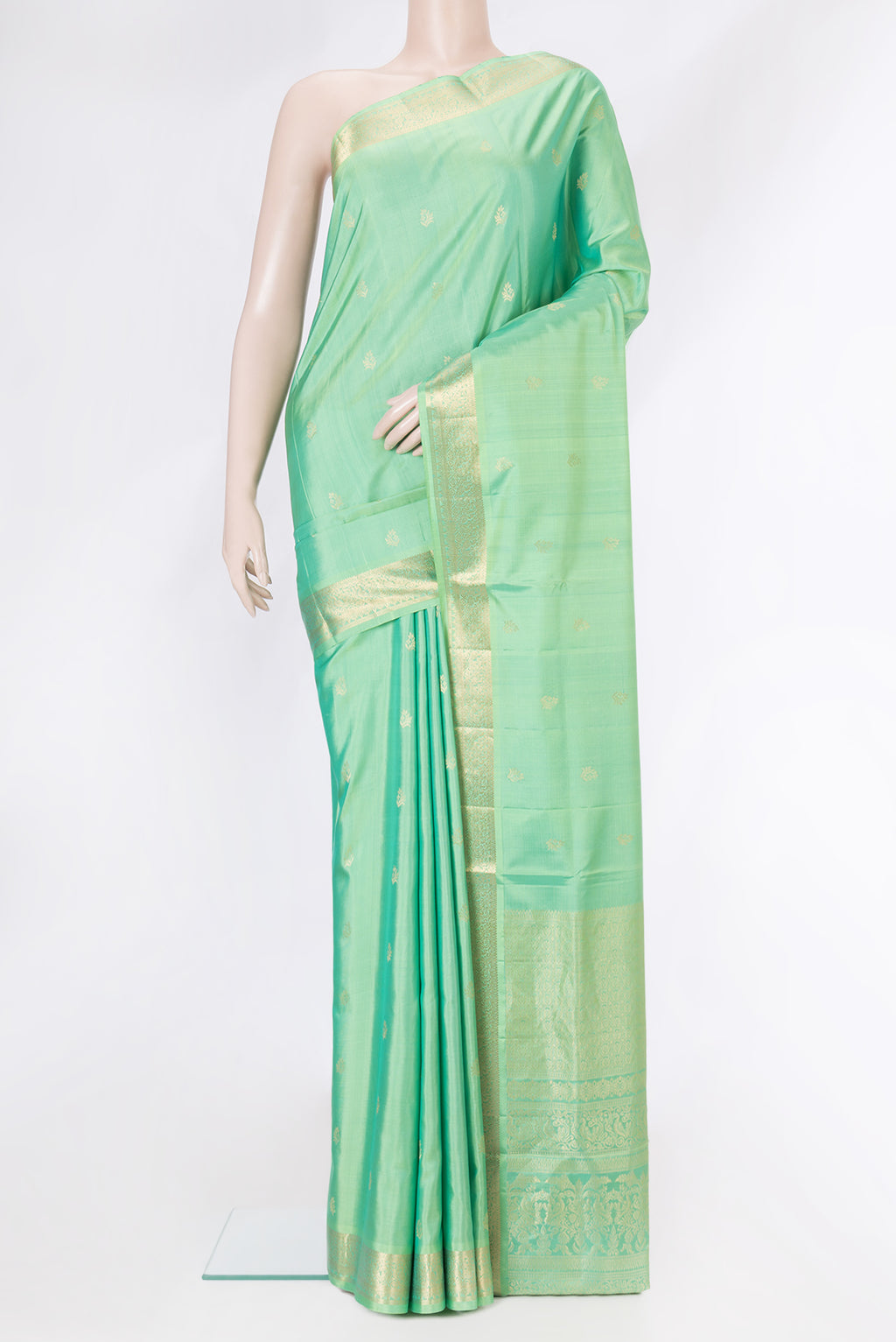 Sea Green Dual Tone Soft Silk Saree with Zari Butta on the body and Zari Border.  displayed on a mannequin