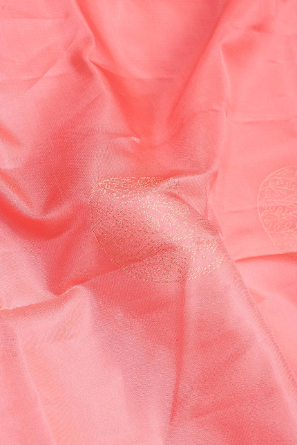 Close up of Pink Soft Silk Saree with Zari Butta on the body and Fancy Border.  displaying folds