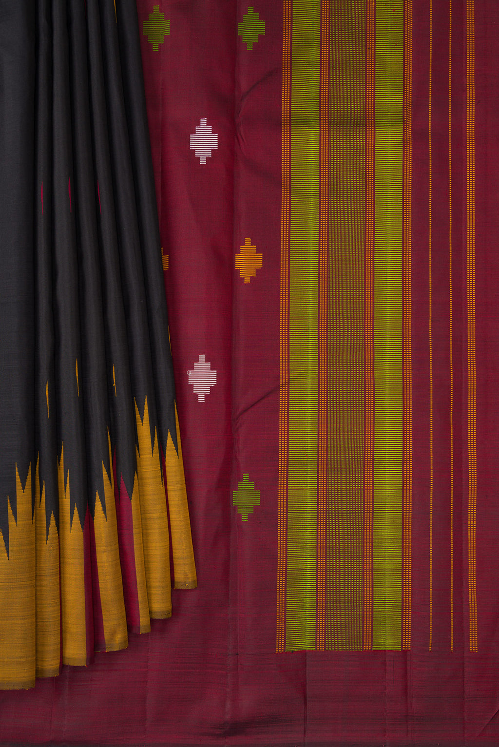 Pleats and pallu of Black Kanchipuram Silk Saree with Thread Butta on the body and Temple Border. 