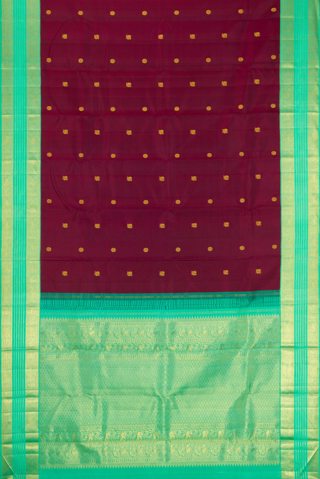 Flat view of Maroon Kanjivaram Silk Saree with Zari Butta on the body and Zari Border. 