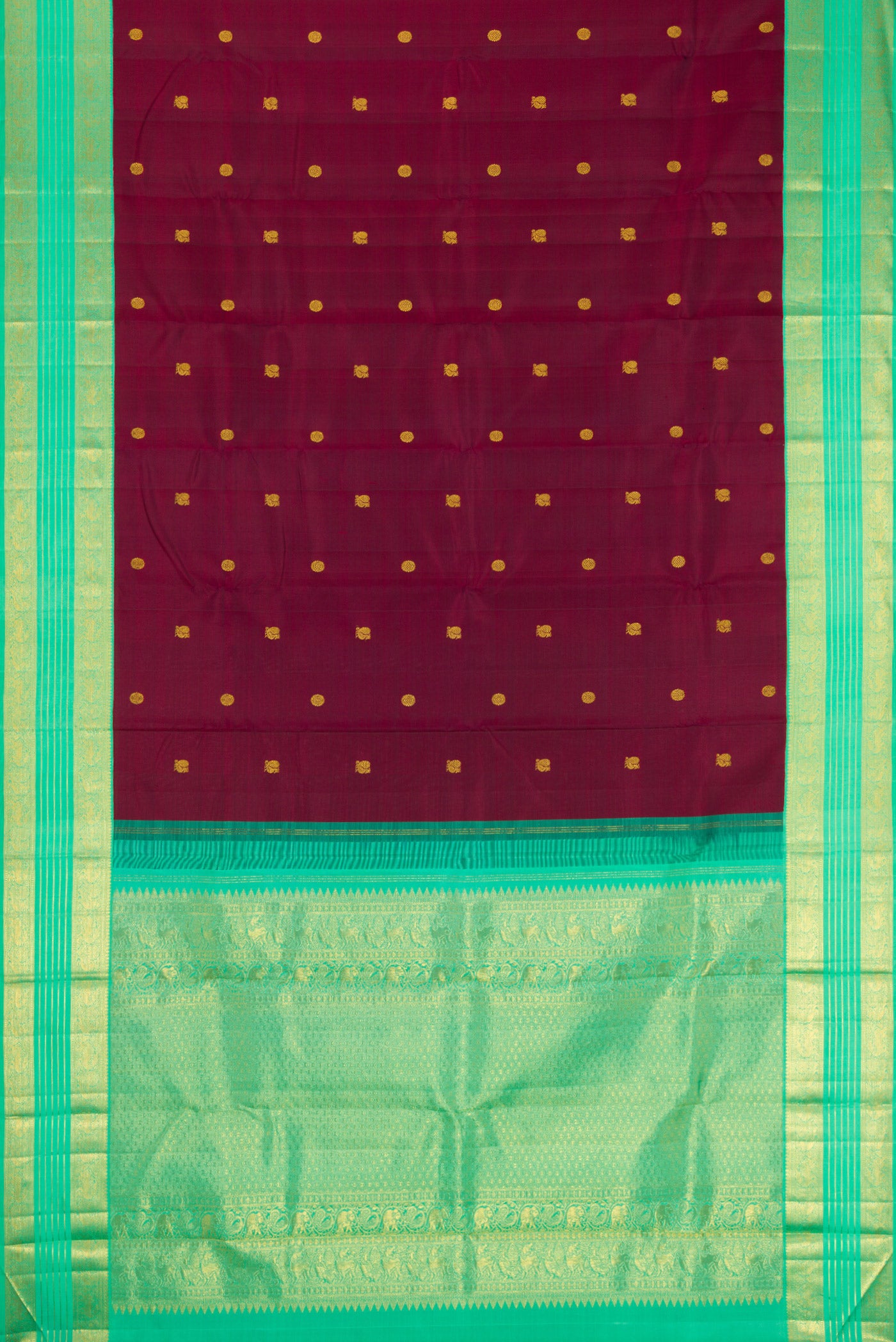 Flat view of Maroon Kanjivaram Silk Saree with Zari Butta on the body and Zari Border. 