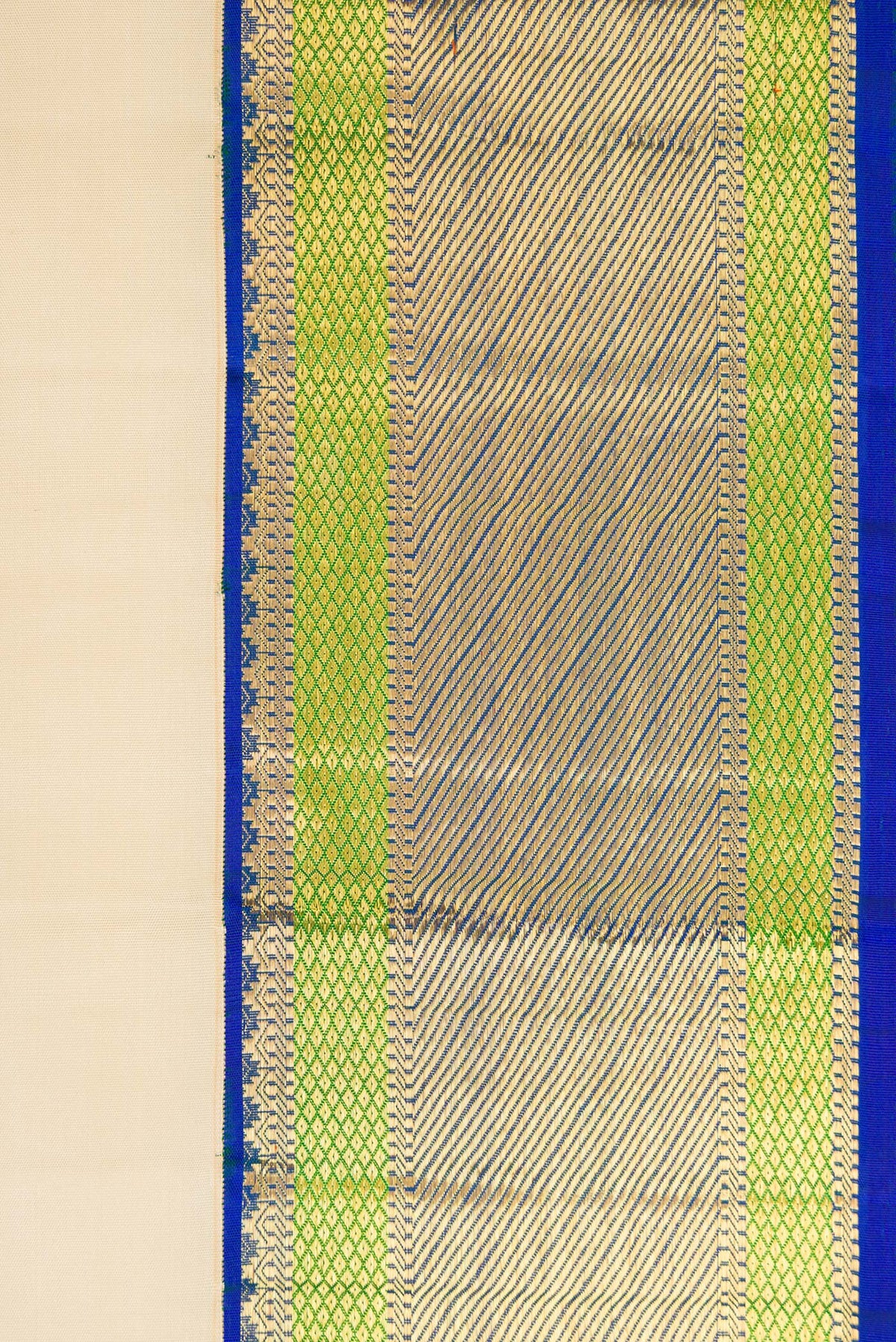 Border image of Beige Dual Tone Kanchipuram Silk Saree with Zari Butta on the body and Zari Border. 