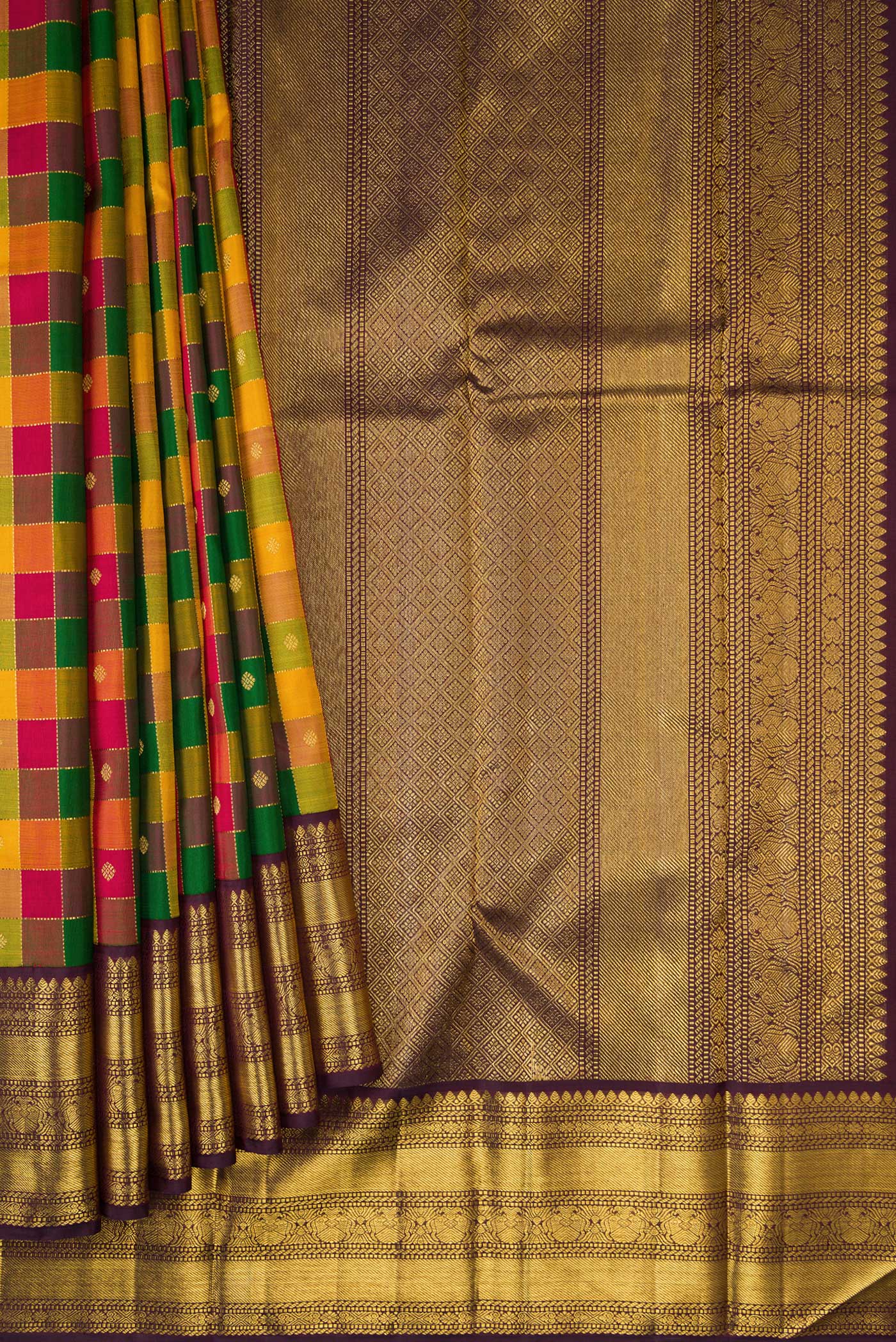 Pleats and pallu of Yellow , Green and Red Color Kanchipuram Silk Saree with Checked design on the body and Zari Border. 