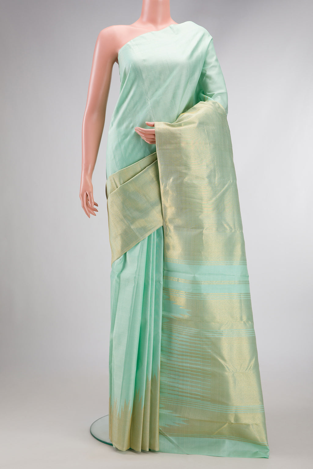 Light Blue Dual Tone Kanjivaram Silk Saree with Stripes on the body and Rising Temple Border.  displayed on a mannequin