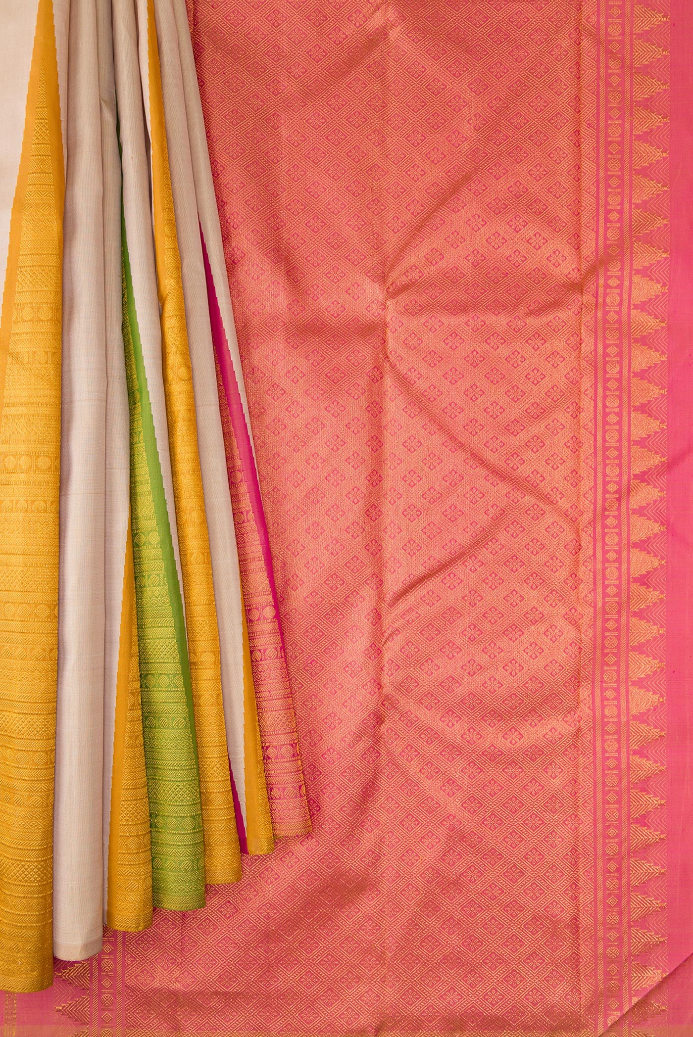 Pleats and pallu of Pure Silk Pure Zari Beige Dual Tone Kanchipuram Saree with Plain Body and One Side Border. 