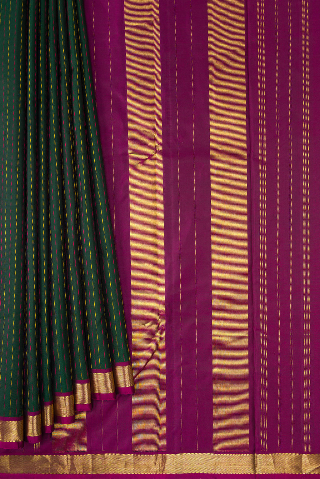 Pleats and pallu of Bottle Green Dual Tone Kanchipuram Silk Saree with Stripes on the body and Zari Border. 