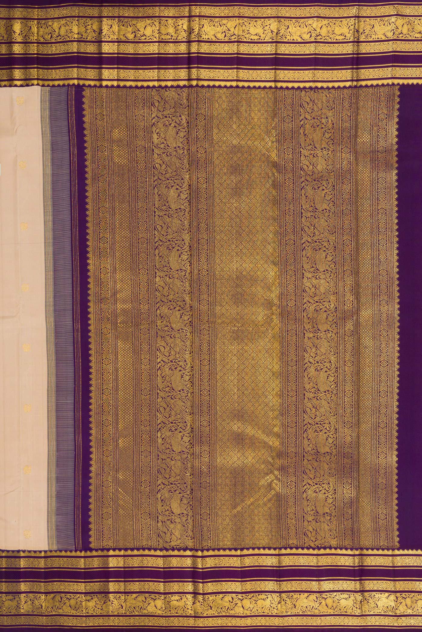 Close up image of the pallu of Beige Dual Tone Kanchipuram Silk Saree with Zari Butta on the body and Zari Border. 