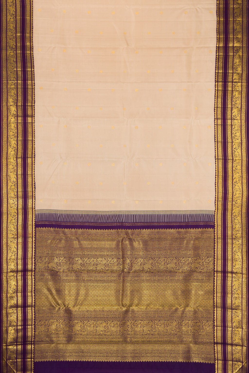 Flat view of Beige Dual Tone Kanchipuram Silk Saree with Zari Butta on the body and Zari Border. 