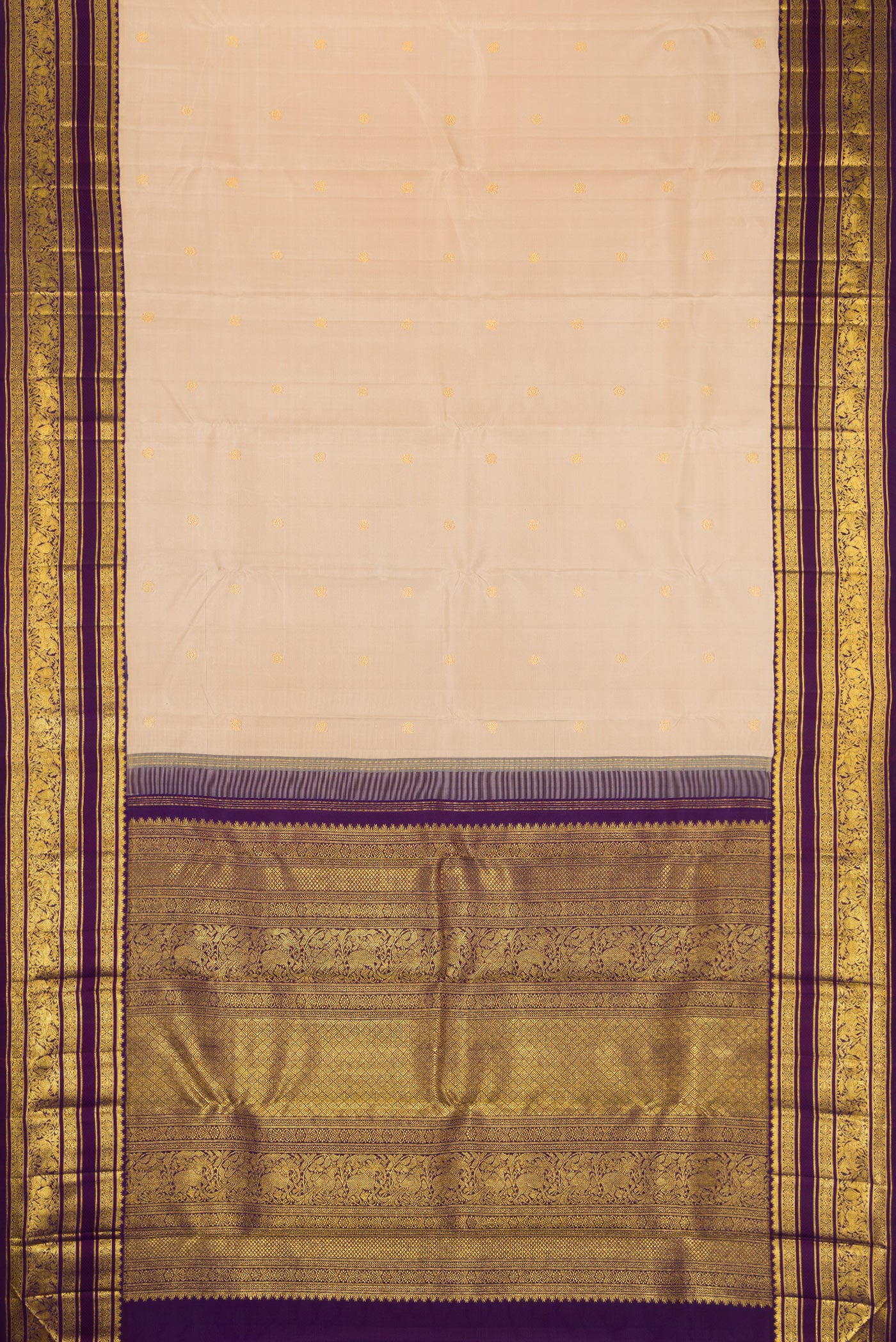 Flat view of Beige Dual Tone Kanchipuram Silk Saree with Zari Butta on the body and Zari Border. 