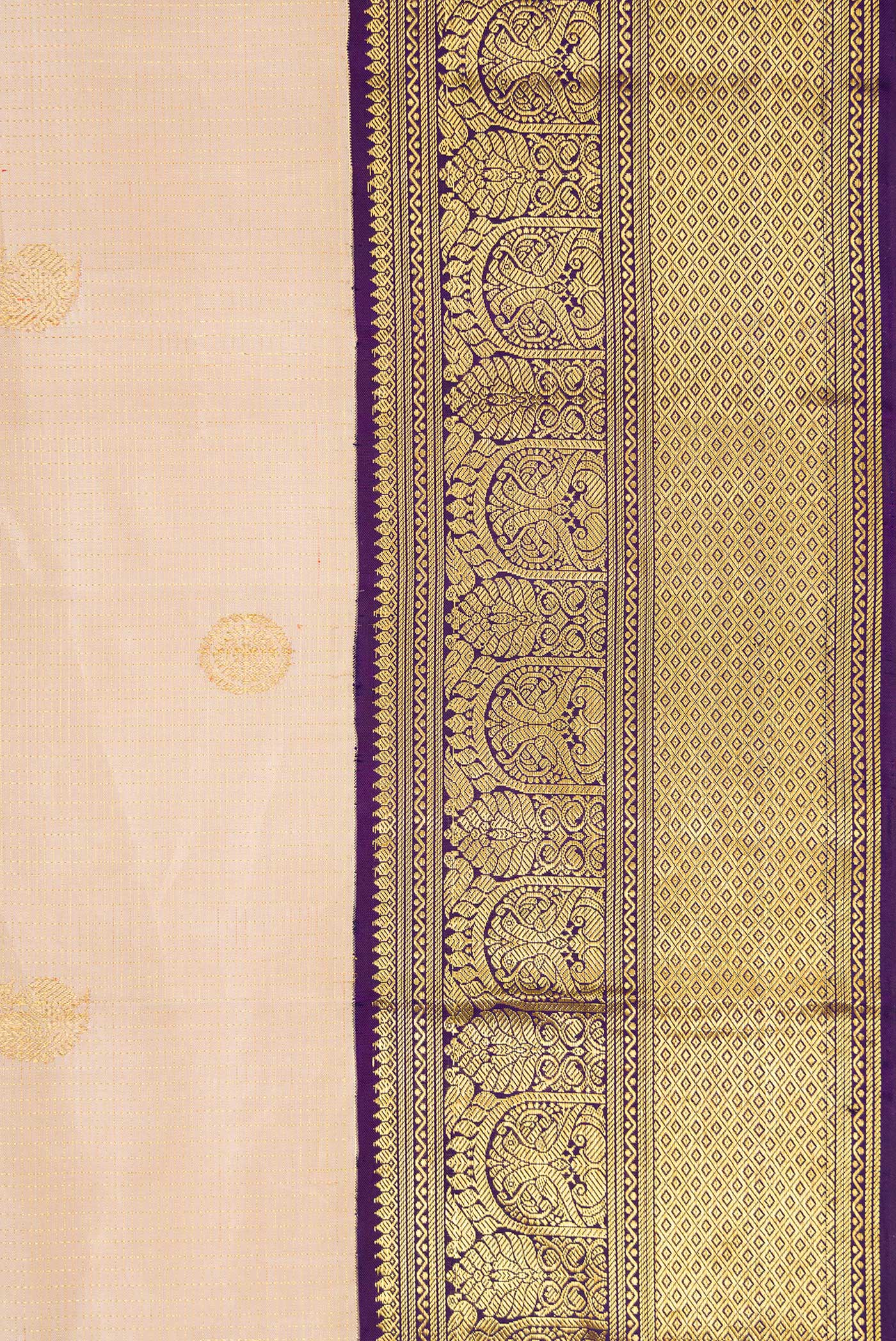 Border image of Dark Beige Dual Tone Kanchipuram Silk Saree with Zari Butta on the body and Zari Border. 