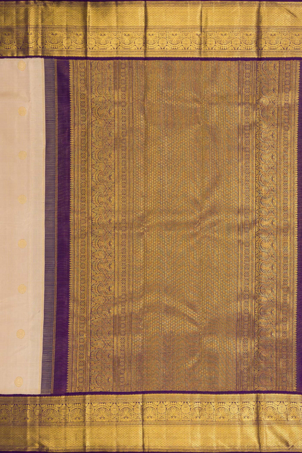 Close up image of the pallu of Dark Beige Dual Tone Kanchipuram Silk Saree with Zari Butta on the body and Zari Border. 