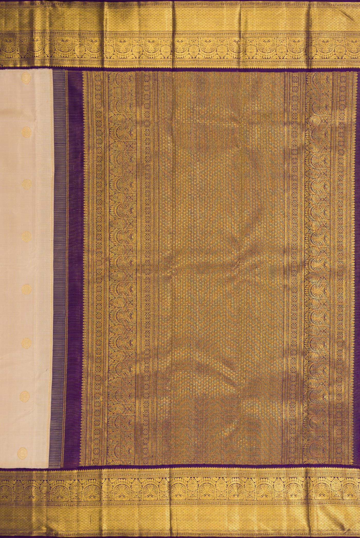 Close up image of the pallu of Dark Beige Dual Tone Kanchipuram Silk Saree with Zari Butta on the body and Zari Border. 