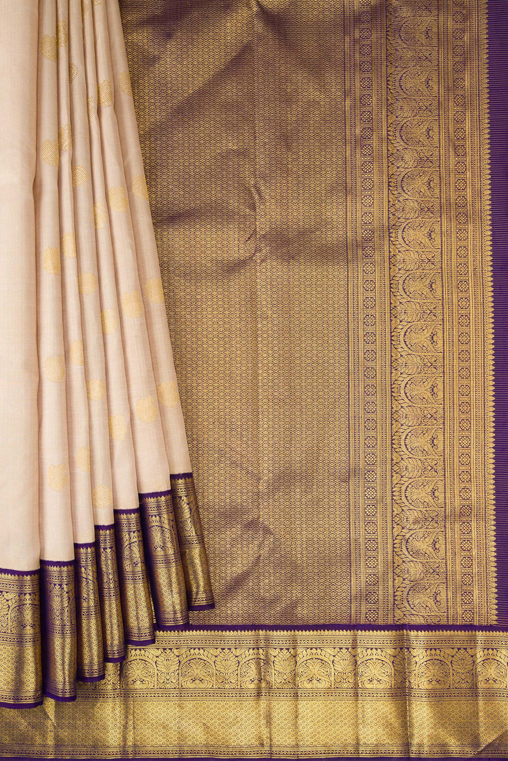Pleats and pallu of Dark Beige Dual Tone Kanchipuram Silk Saree with Zari Butta on the body and Zari Border. 