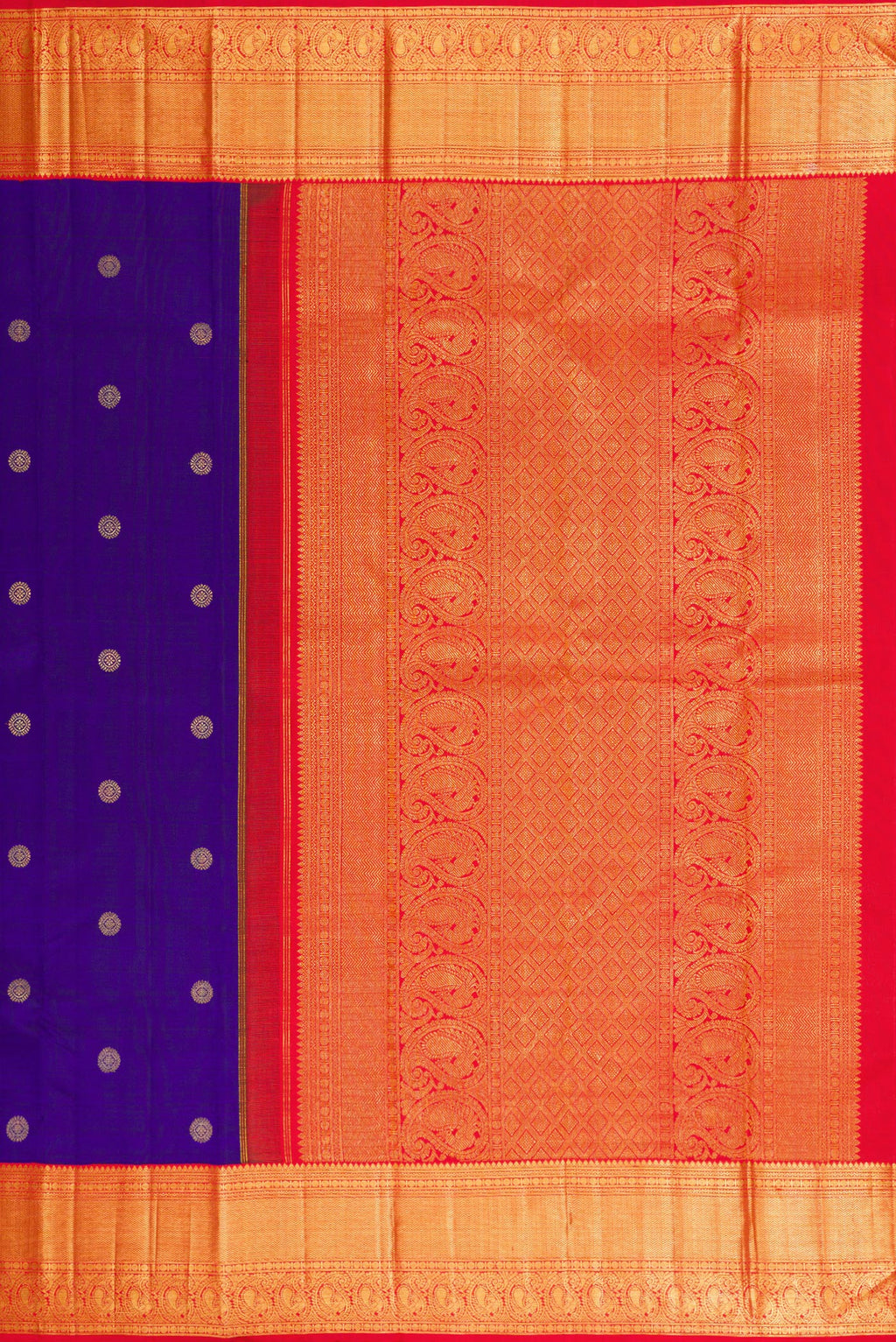 Close up image of the pallu of Royal Blue Dual Tone Kanchipuram Silk Saree with Zari Butta on the body and Zari Border. 