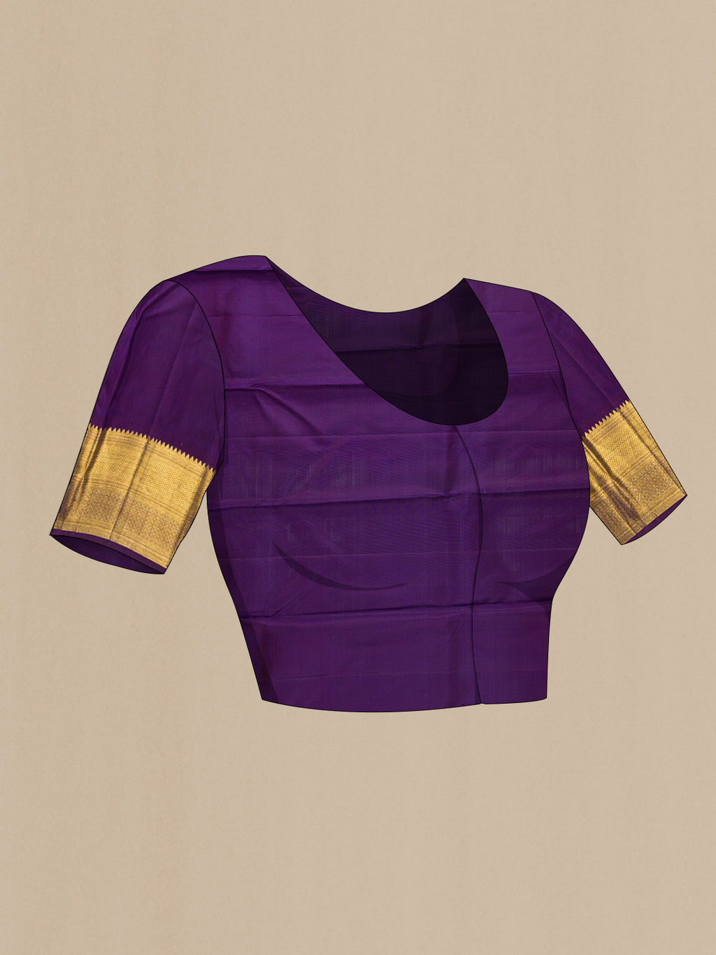 Close up image of the blouse of Beige Kanchipuram Silk Saree with Zari Butta on the body and Zari Border. 