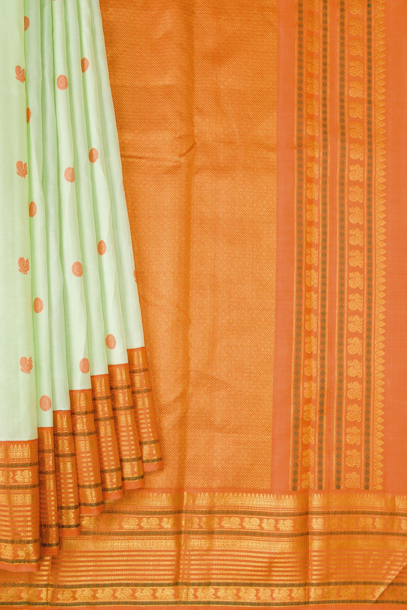 Pleats and pallu of Pure Silk Pure Zari Pista Green Dual Tone Kanjivaram Saree with Thread Butta on the body and Zari Border. 