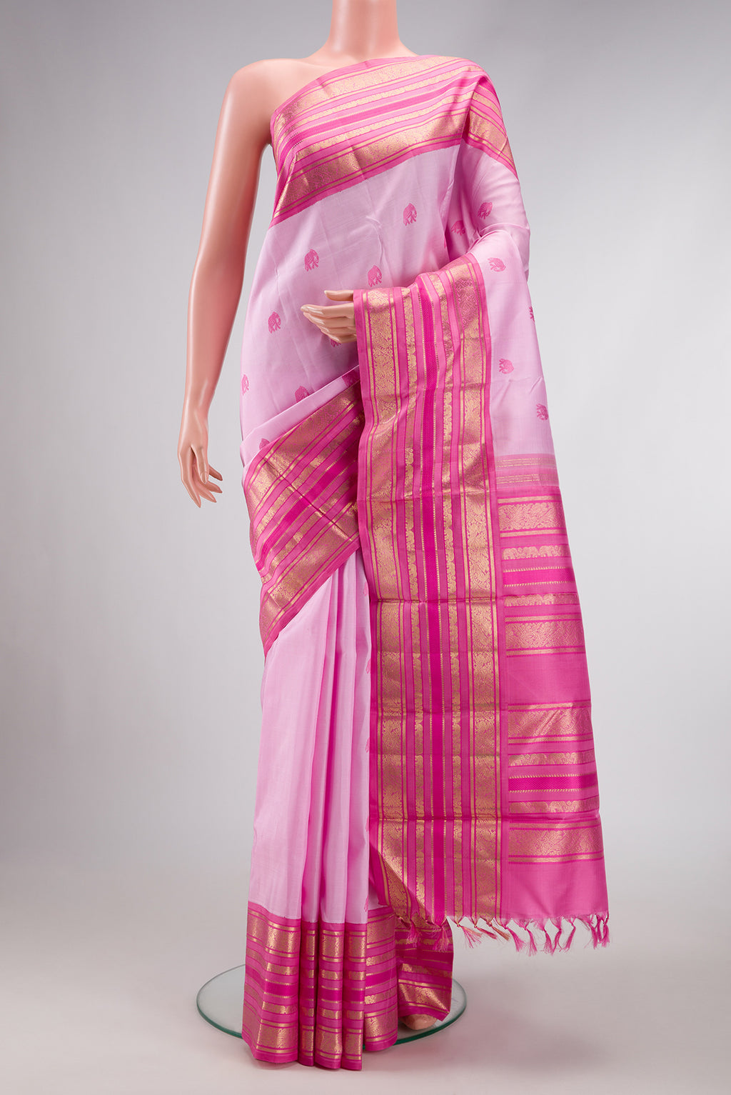 Pure Silk Pure Zari Rose pink Dual Tone Kanchipuram Saree with Thread Butta on the body and Fancy Border.  displayed on a mannequin