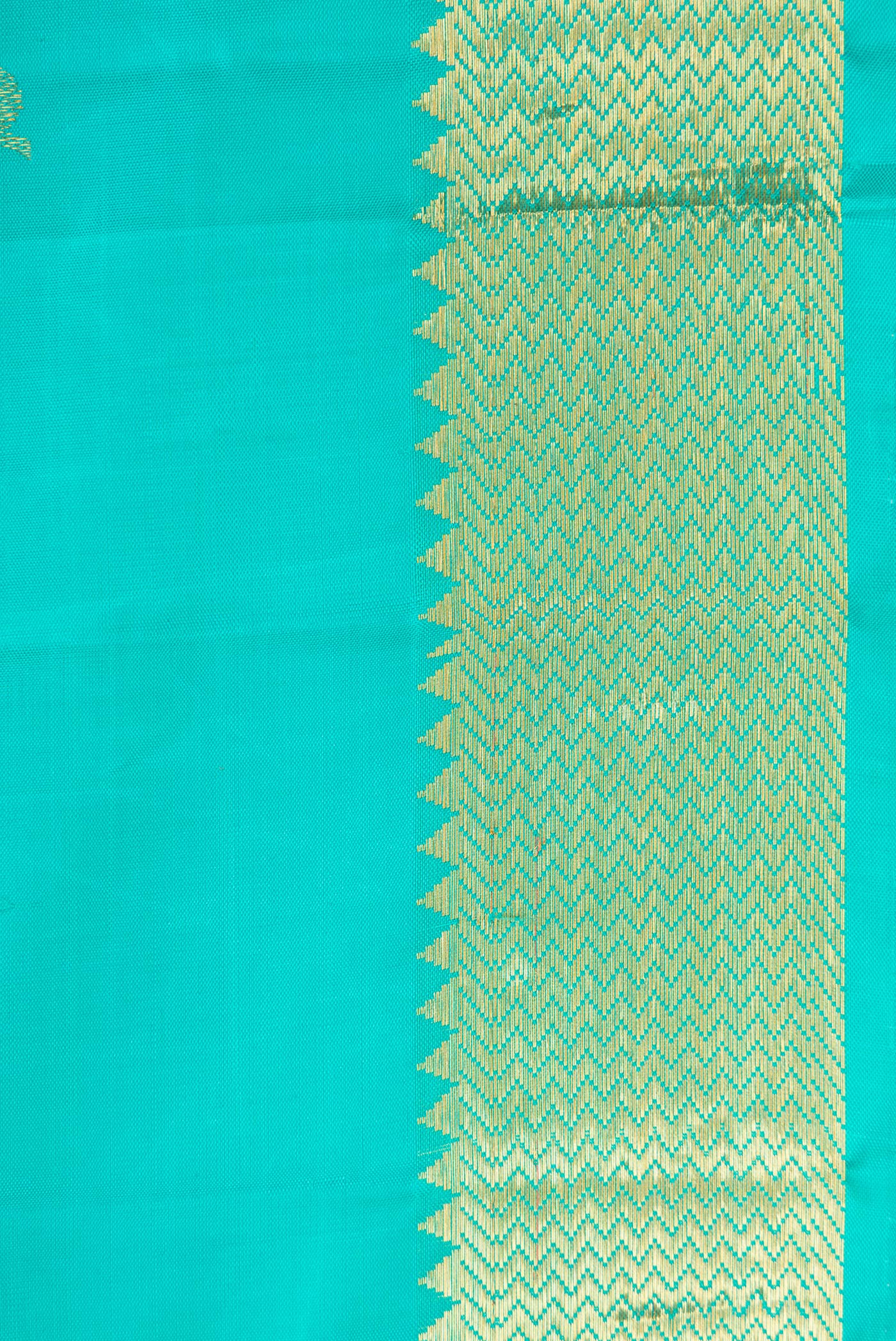 Border image of Sea Green Dual Tone Kanjivaram Silk Saree with Zari Butta on the body and Zari Border. 