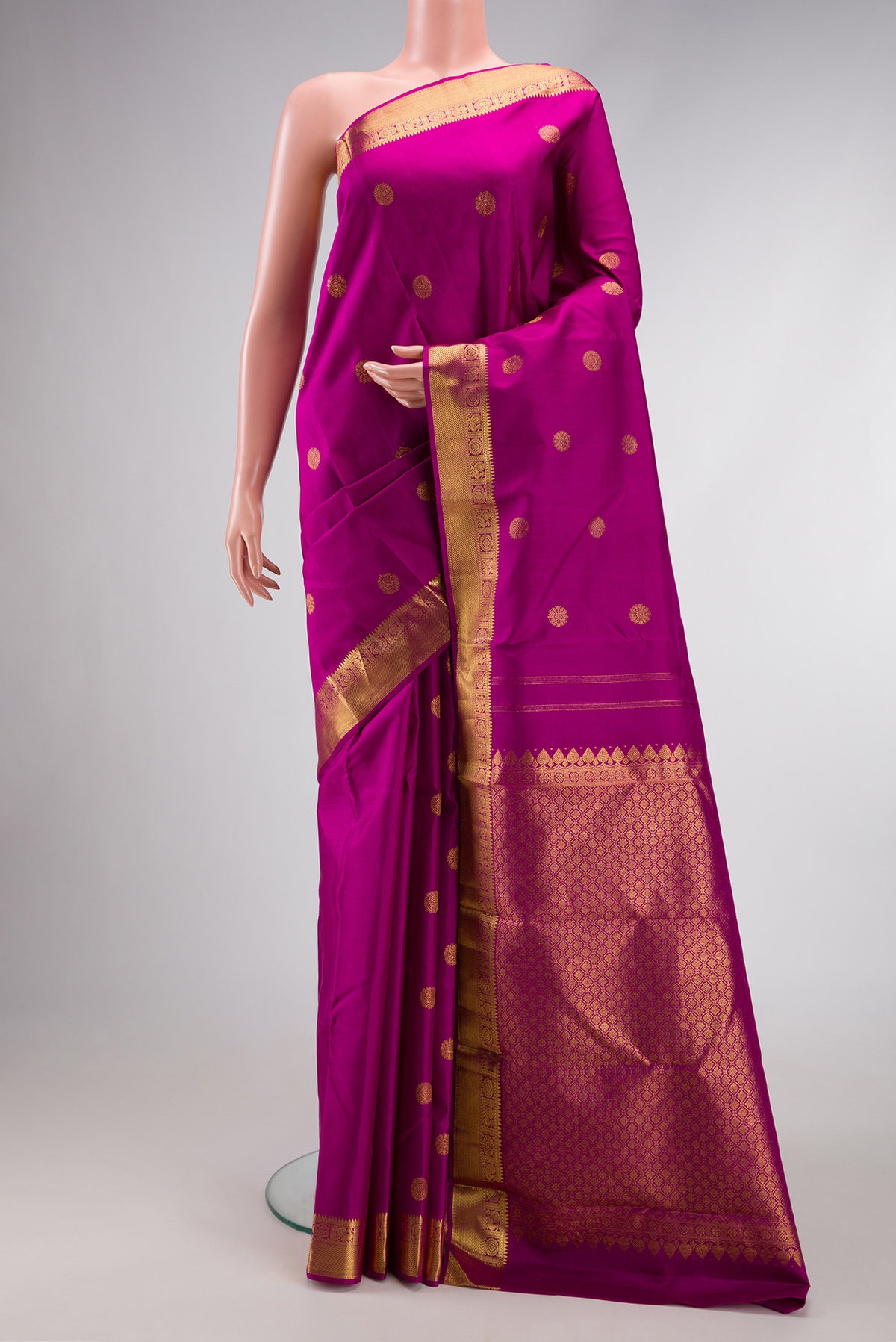 Purple Dual Tone Kanjivaram Silk Saree with Zari Butta on the body and Zari Border.  displayed on a mannequin