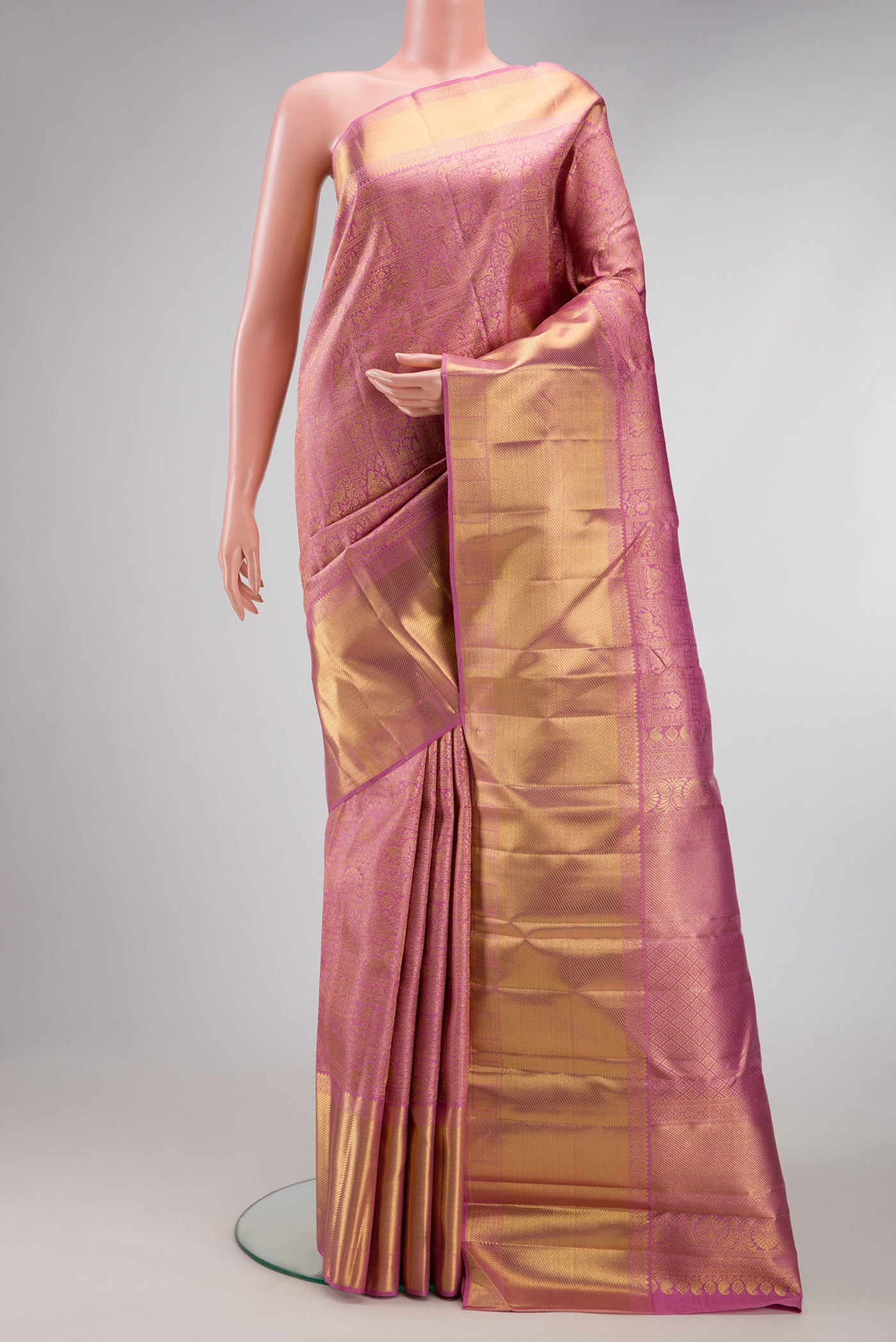 Pure Silk Pure Zari Pink Dual Tone Kanjivaram Saree with Zari Brocade on the body and Zari Border.  displayed on a mannequin
