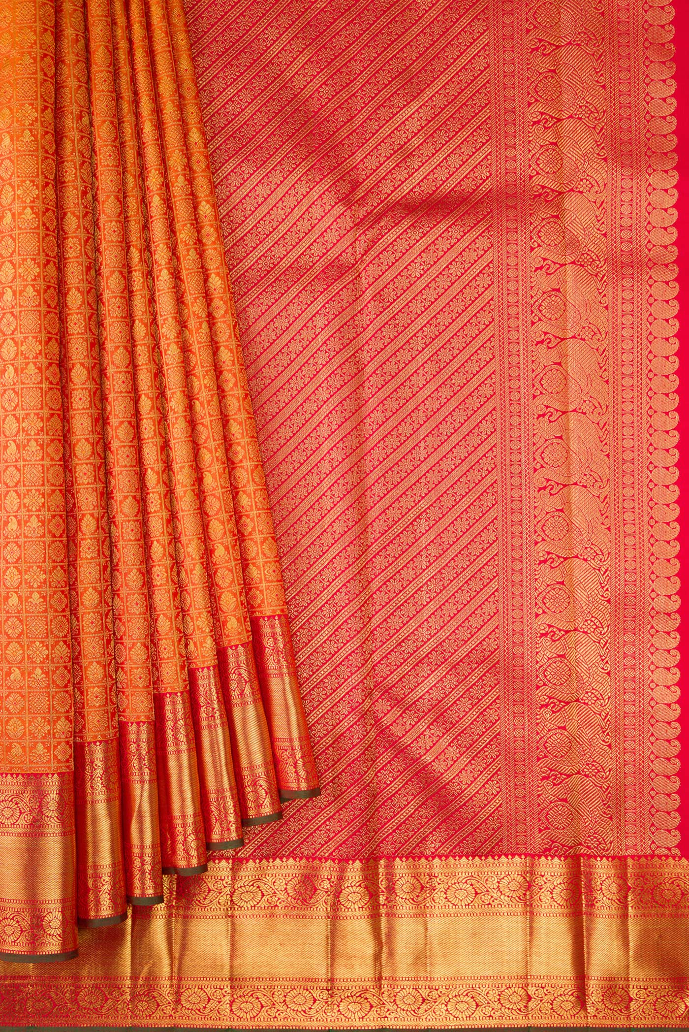 Pleats and pallu of Pure Silk Pure Zari Mustard Dual Tone Kanjivaram Saree with Zari Brocade on the body and Zari Border. 