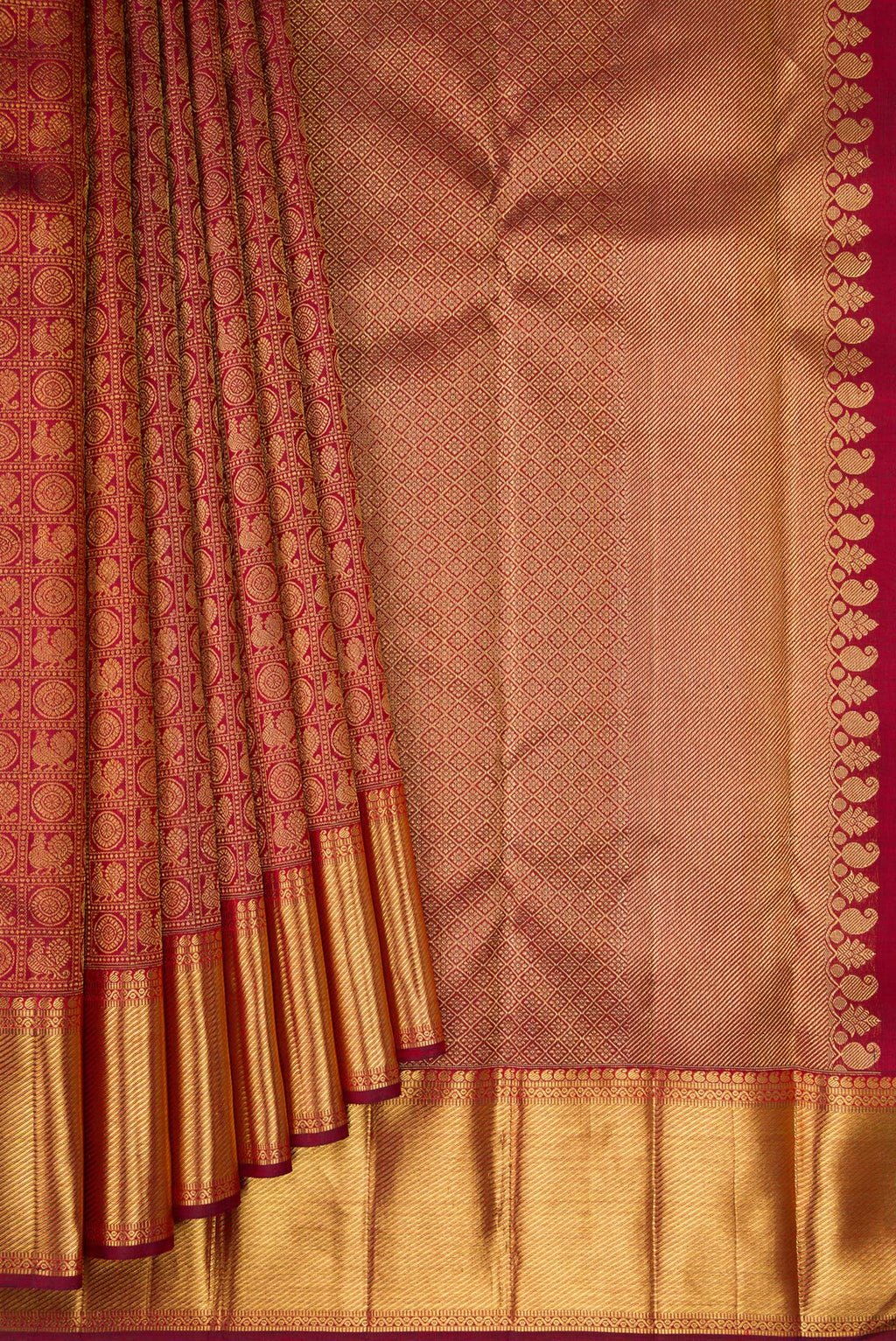 Pleats and pallu of Pure Silk Pure Zari Maroon Kanjivaram Saree with Zari Brocade on the body and Zari Border. 