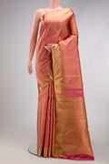Pure Silk Pure Zari Rose Gold Dual Tone Kanjivaram Saree with Zari Brocade on the body and Zari Border.  displayed on a mannequin