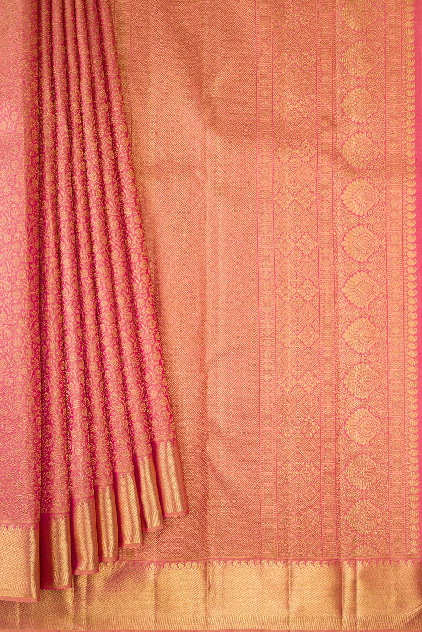 Pleats and pallu of Pure Silk Pure Zari Rose Gold Dual Tone Kanjivaram Saree with Zari Brocade on the body and Zari Border. 