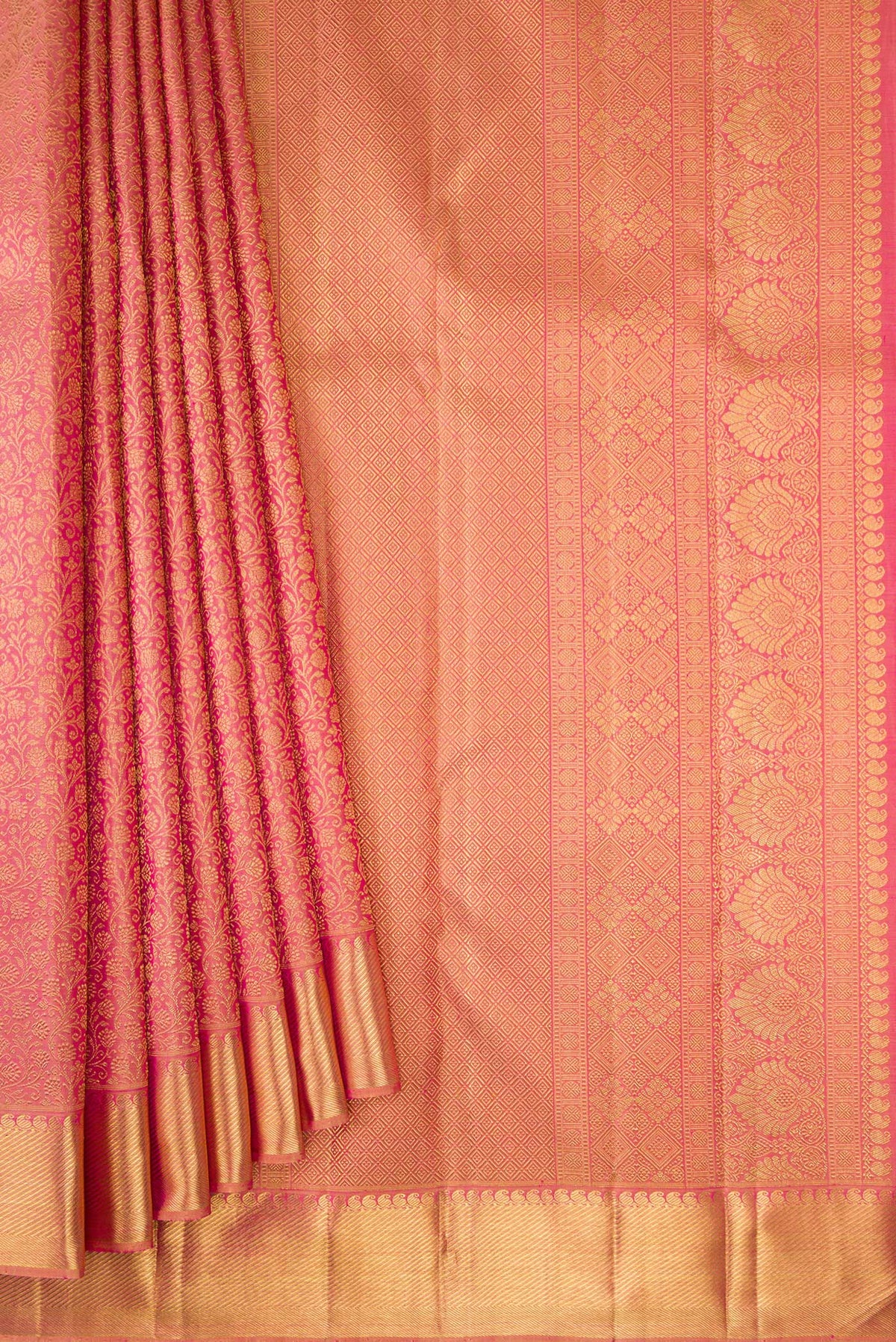 Pleats and pallu of Pure Silk Pure Zari Rose Gold Dual Tone Kanjivaram Saree with Zari Brocade on the body and Zari Border. 