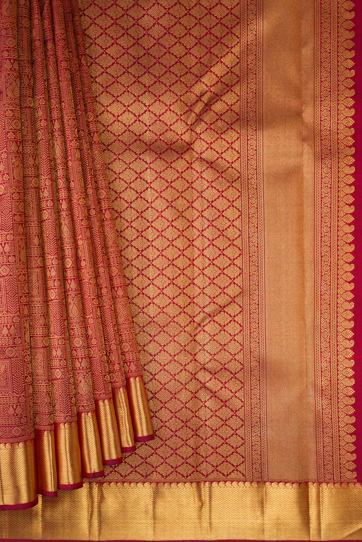 Pleats and pallu of Pure Silk Pure Zari Maroon Kanjivaram Saree with Zari Brocade on the body and Zari Border. 