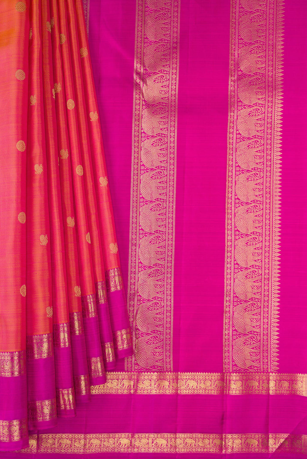 Pleats and pallu of Pure Silk Pure Zari Coral Dual Tone Kanjivaram Saree with Zari Butta on the body and Zari Border. 