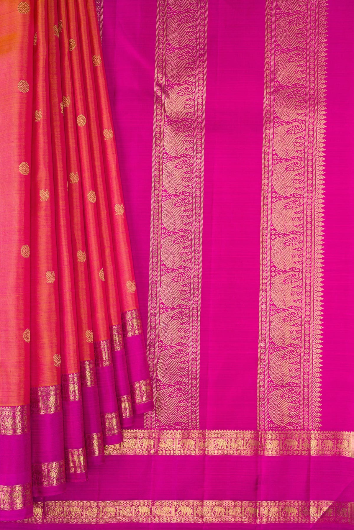 Pleats and pallu of Pure Silk Pure Zari Coral Dual Tone Kanjivaram Saree with Zari Butta on the body and Zari Border. 