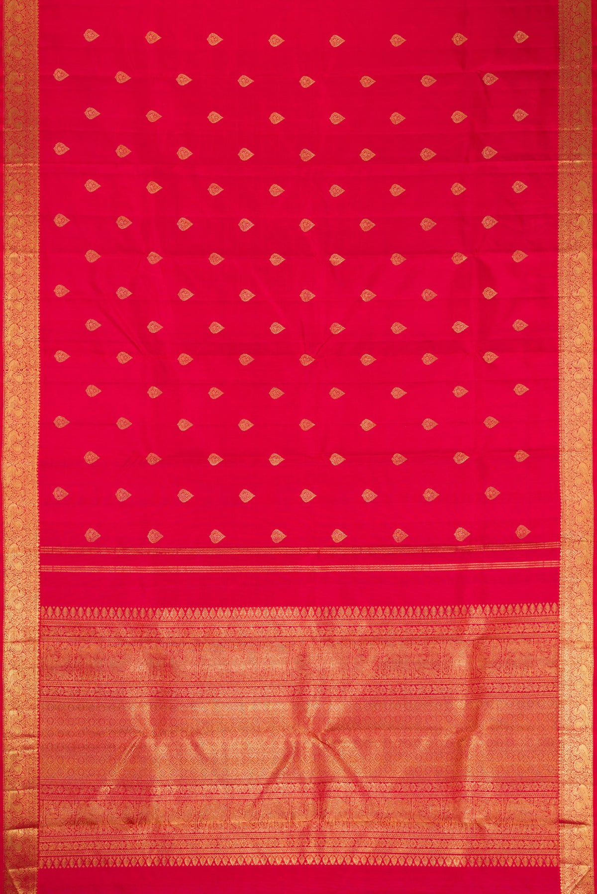 Flat view of Red Dual Tone Kanjivaram Silk Saree with Zari Butta on the body and Zari Border. 