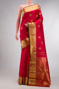 Pure Silk Pure Zari Red Dual Tone Kanjivaram Saree with Zari Butta on the body and Zari Border.  displayed on a mannequin